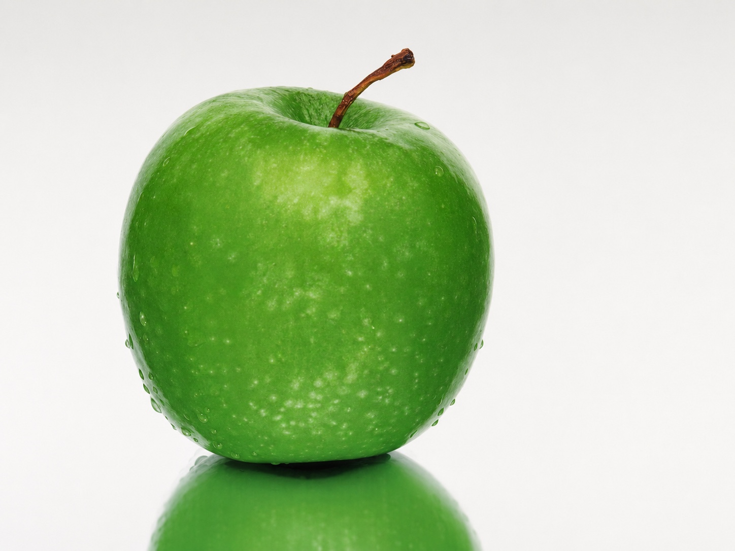Grüner Apfel als Symbol für Vorsorge